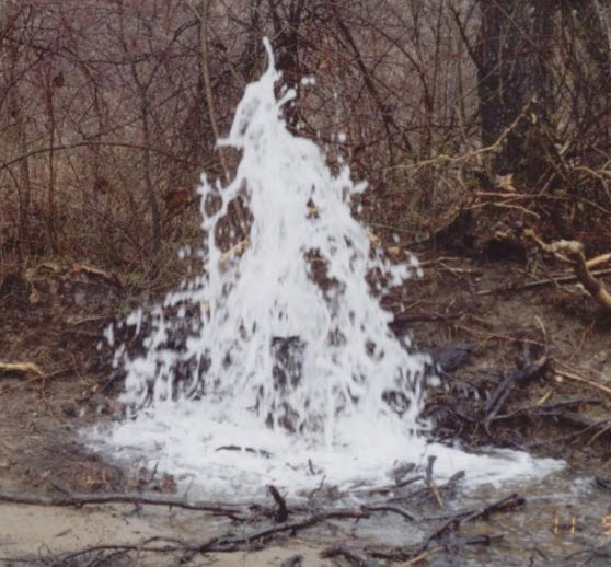 Abandoned Well Spouting Water